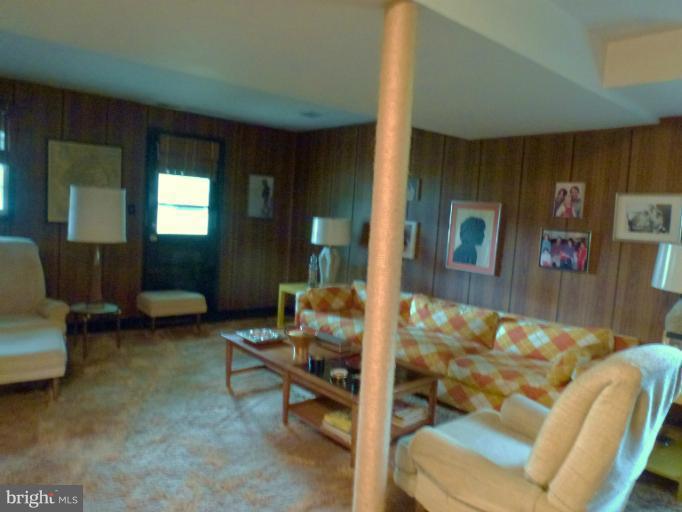 3003 Northbrook Road Baltimore, MD 21208 - Photo 12 of 19 a room with furniture and a table
