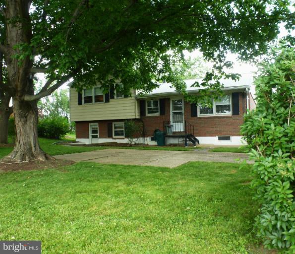3003 Northbrook Road Baltimore, MD 21208 - Photo 15 of 19 a front view of house with yard and green space