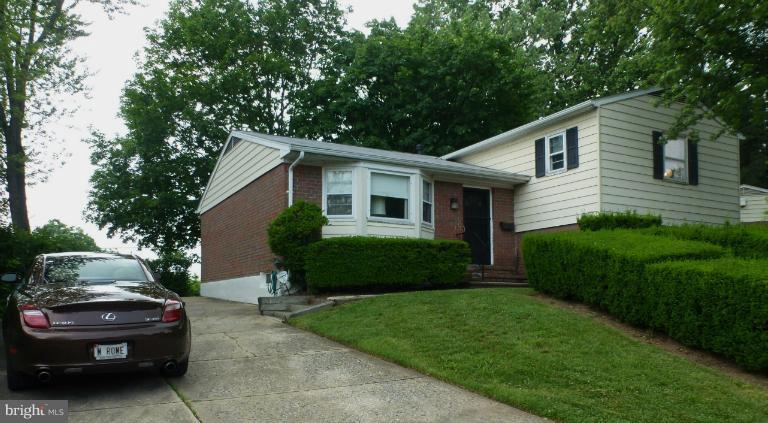 3003 Northbrook Road Baltimore, MD 21208 - Photo 19 of 19 a front view of a house with a garden