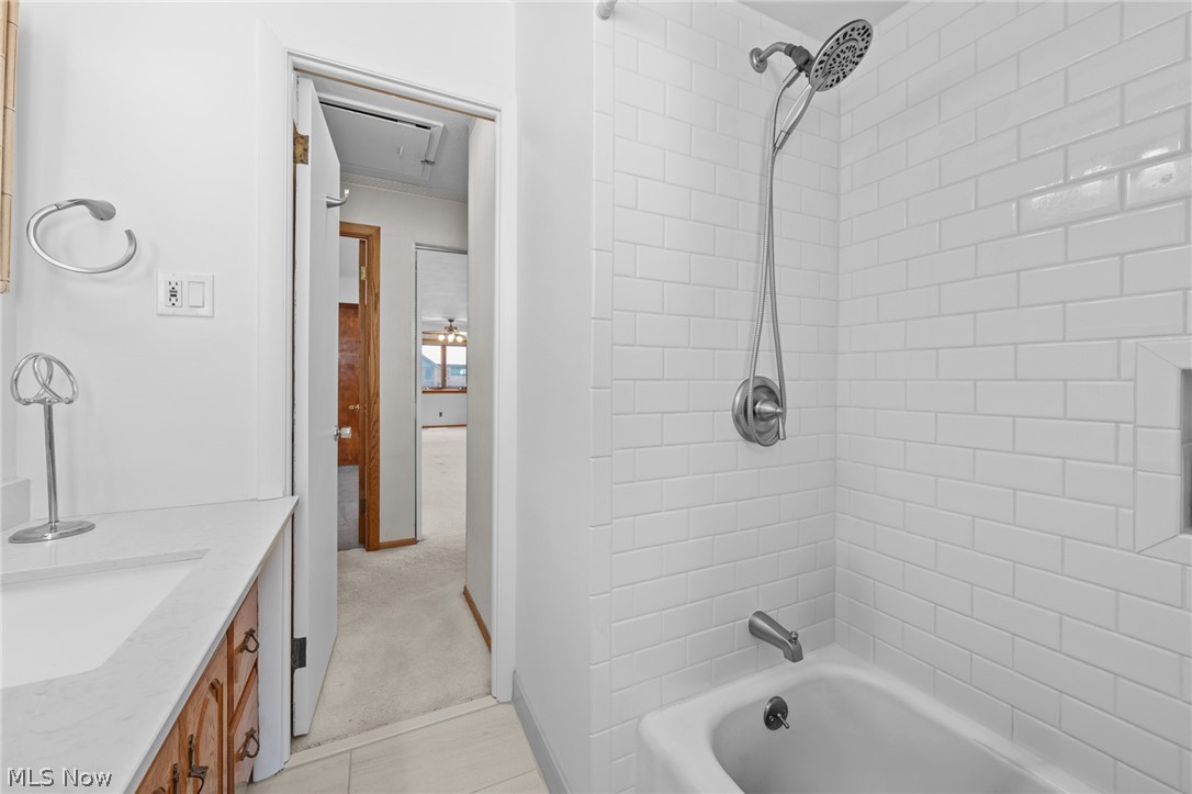 1759 Chelmsford Road Mayfield Heights, OH 44124 - Photo 22 of 39 Subway tile offers a fresh look in the tub-shower combo.