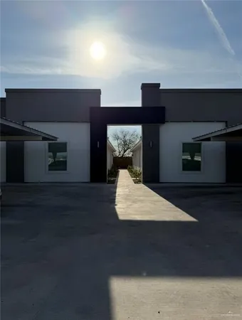 a picture of a living room with a fireplace