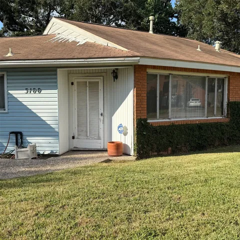 a front view of a house with garage