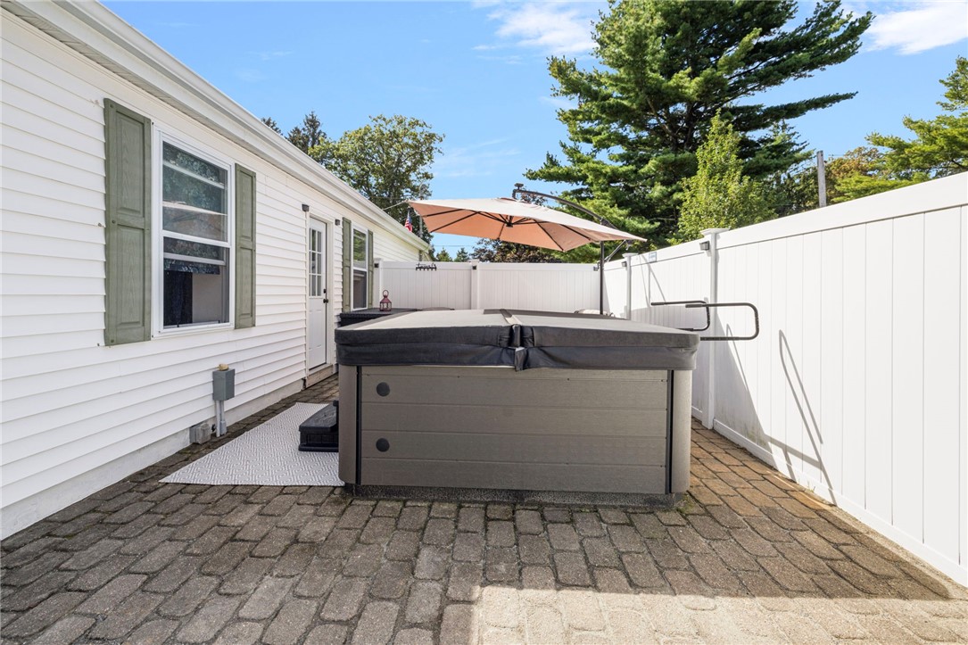 145 Jenckes Hill Road Lincoln, RI 02865 - Photo 26 of 39 This oversized, stone patio lends itself to many uses.