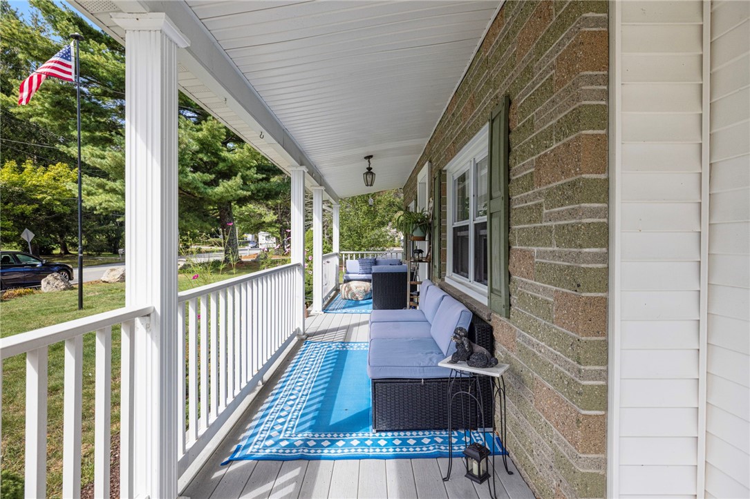 145 Jenckes Hill Road Lincoln, RI 02865 - Photo 3 of 39 The front porch is a perfect spot for entertaining and a fabulous space to decorate for extra curb appeal!