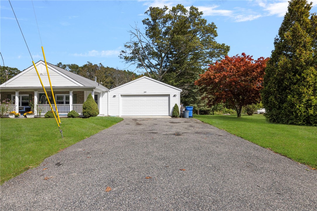 145 Jenckes Hill Road Lincoln, RI 02865 - Photo 38 of 39 Two-car garage with onsite parking for four, additional cars.