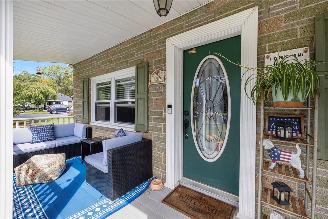 145 Jenckes Hill Road Lincoln, RI 02865 - Photo 5 of 39 A covered entryway keeps you and your guests dry.