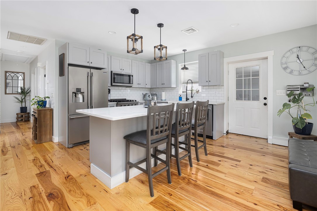 145 Jenckes Hill Road Lincoln, RI 02865 - Photo 6 of 39 Enter into the gorgeous, modern kitchen.
