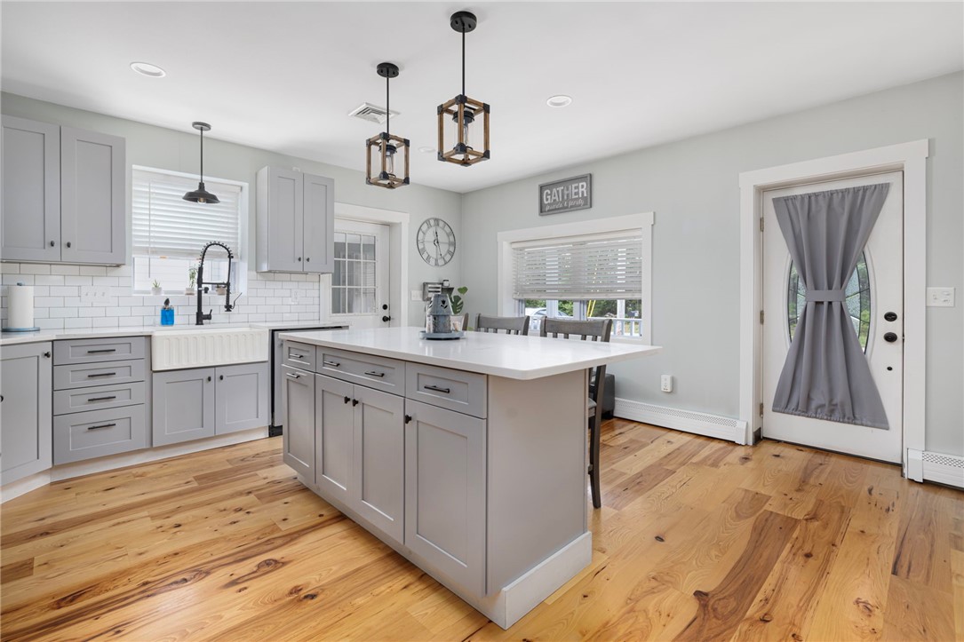145 Jenckes Hill Road Lincoln, RI 02865 - Photo 7 of 39 A large kitchen island with seating for convenience.