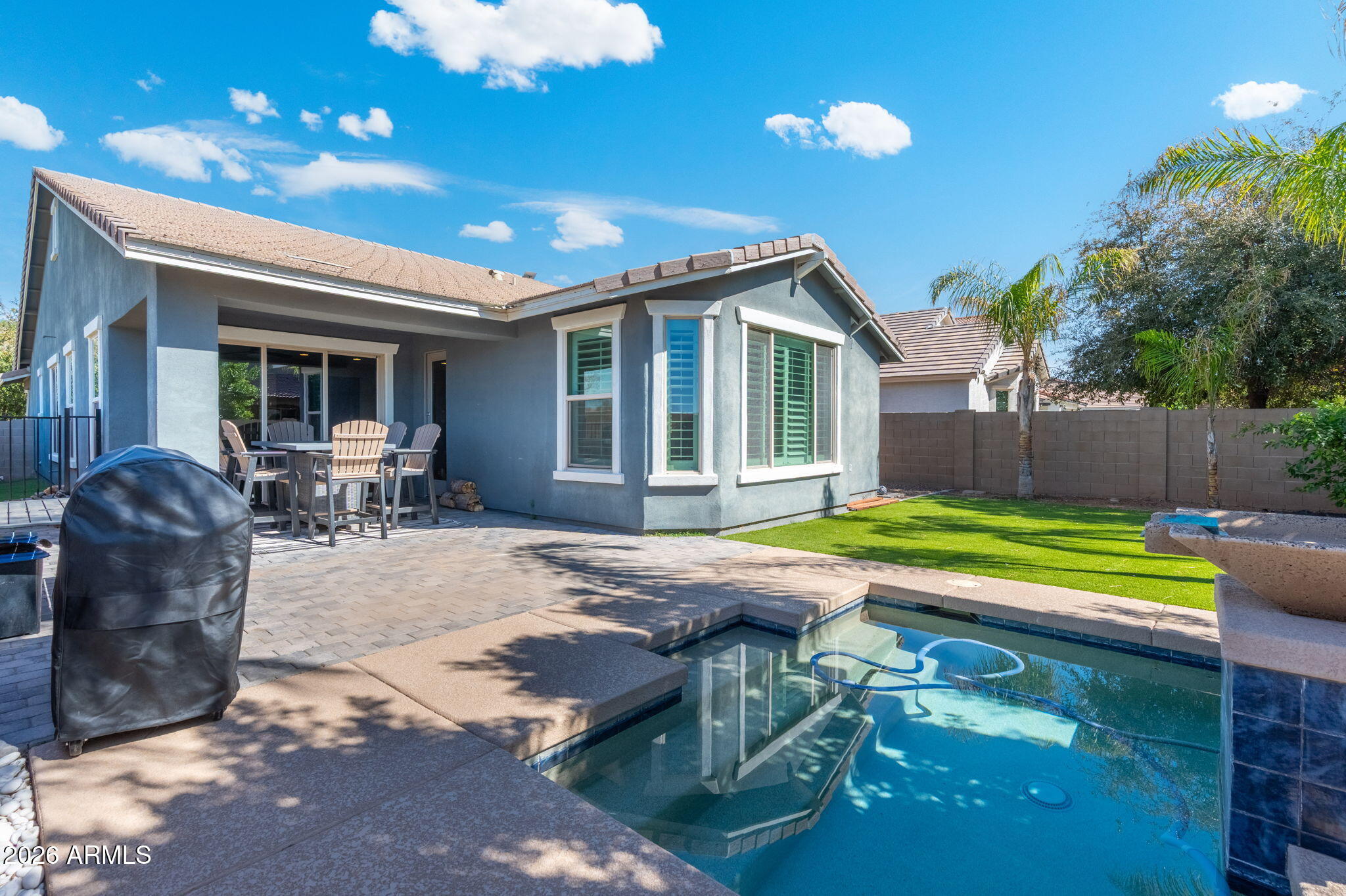 4041 East Amber Lane Gilbert, AZ 85296 - Photo 28 of 31 a view of a house with backyard and sitting area