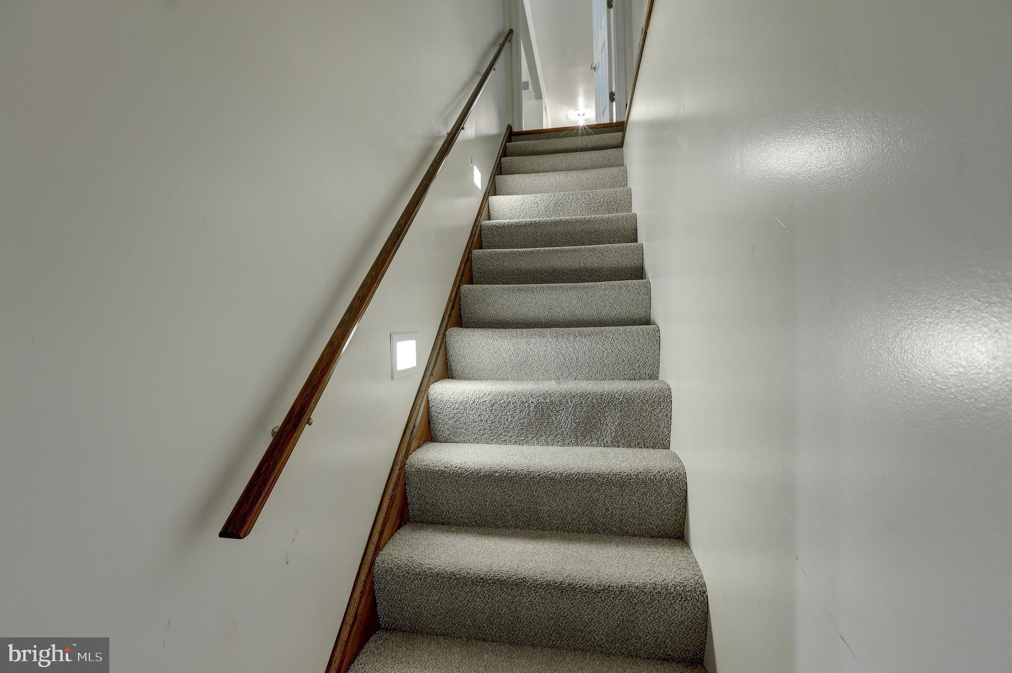 5602 Patterson Road Baldwin, MD 21013 - Photo 76 of 88 Basement stairs with wall mount lighting