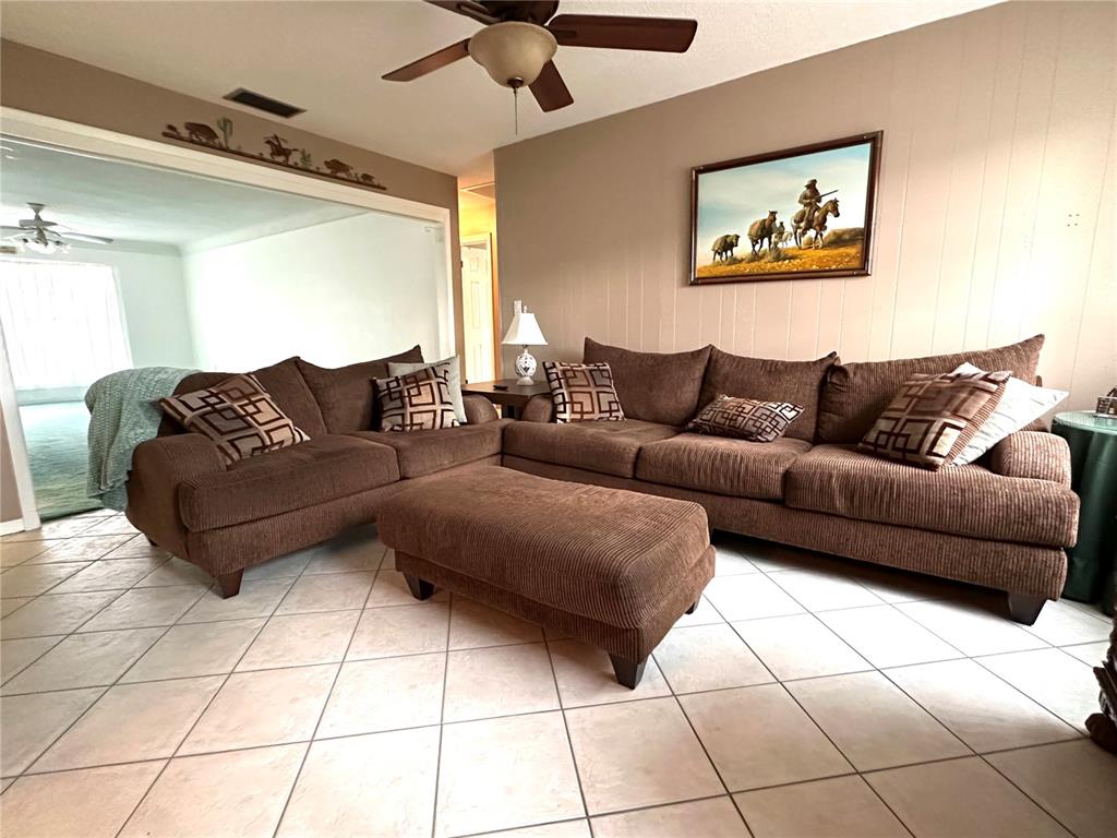 10400 112th Way Largo, FL 33778 - Photo 12 of 30 a living room with furniture and a rug