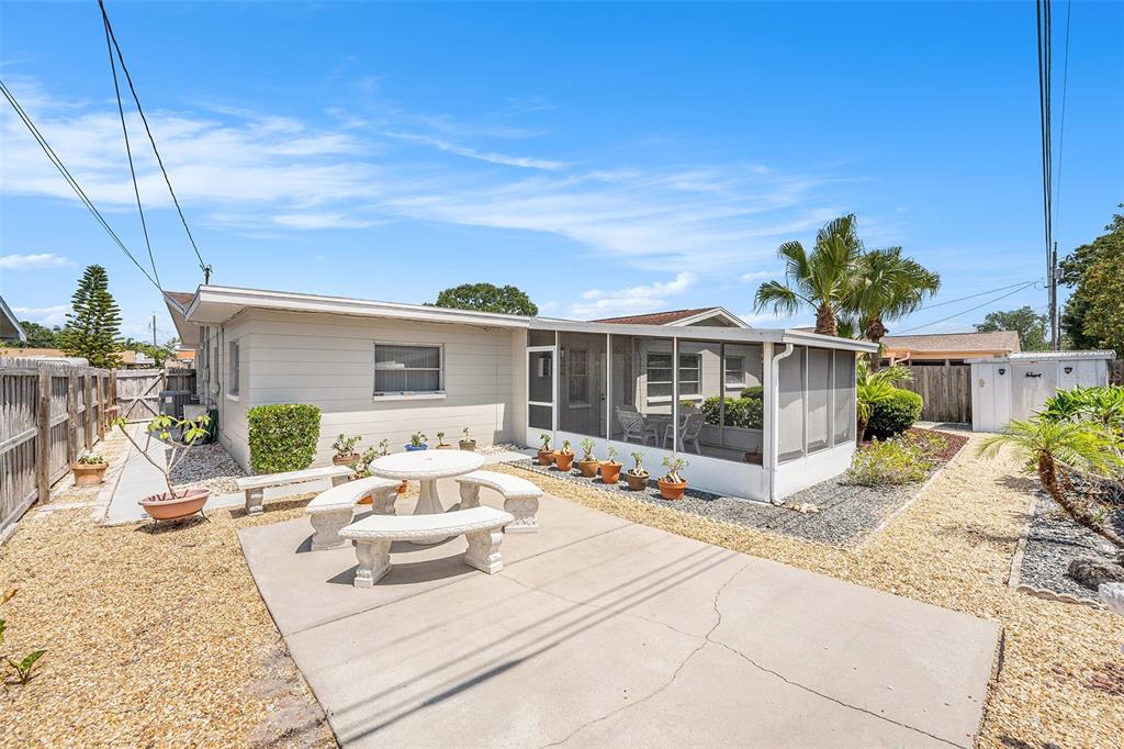 10400 112th Way Largo, FL 33778 - Photo 24 of 30 a front view of a house with a sitting area