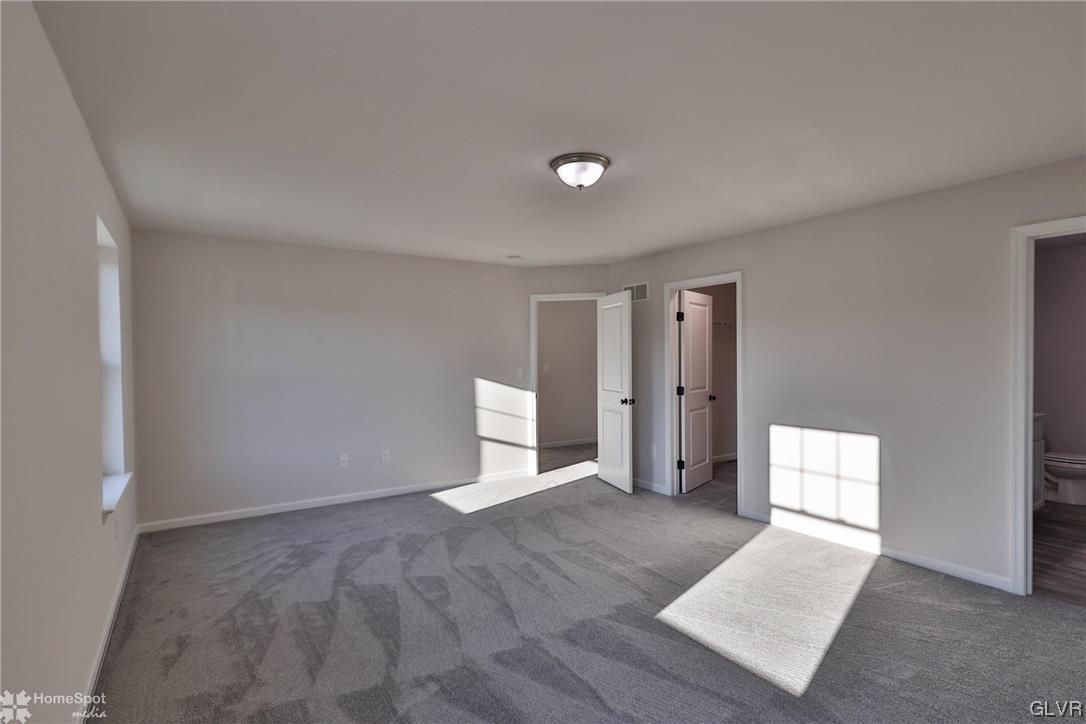 647 Sipos Drive Northampton, PA 18067 - Photo 32 of 47 wooden floor in an empty room with a window