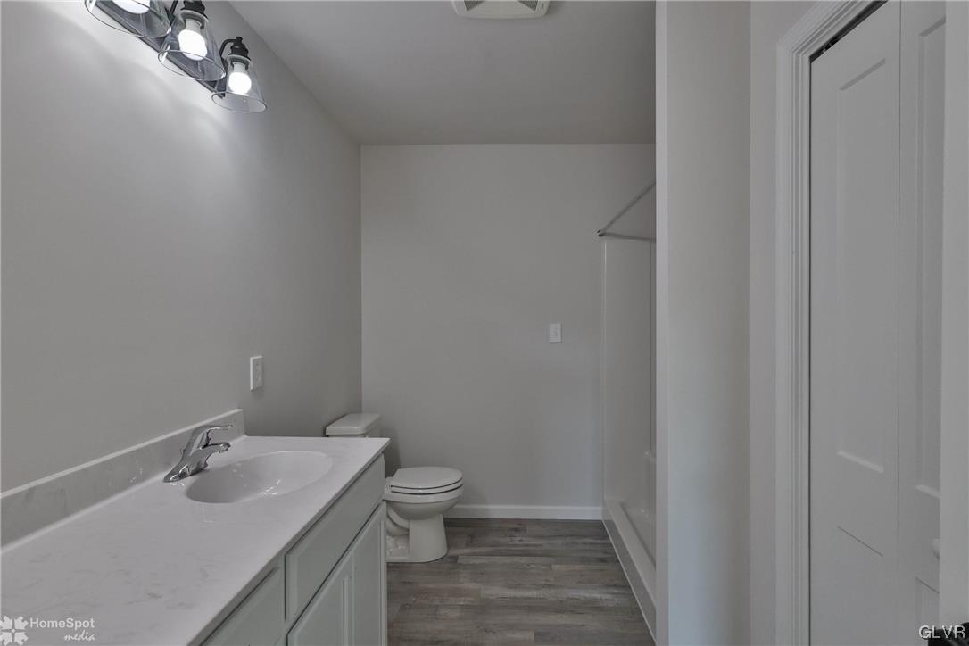 647 Sipos Drive Northampton, PA 18067 - Photo 36 of 47 a bathroom with a sink toilet and vanity