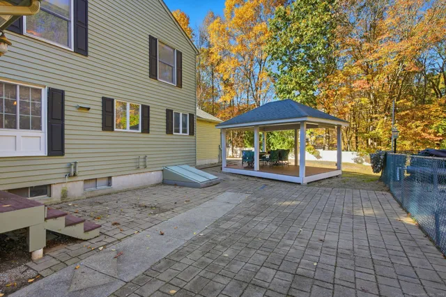 a view of a house with a big yard