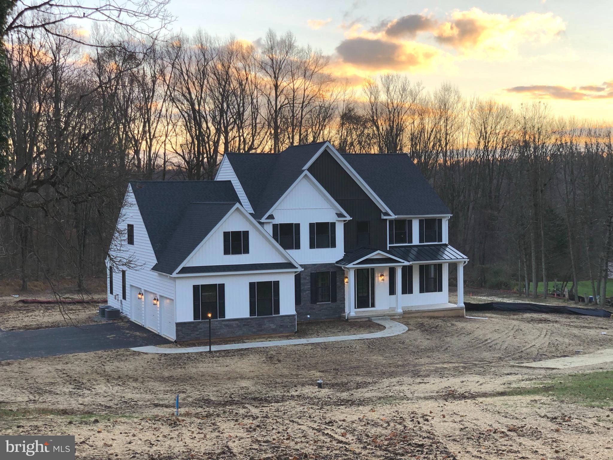 689 Cheyney Road Glen Mills, PA 19319 - Photo 11 of 11 a house with trees in the background