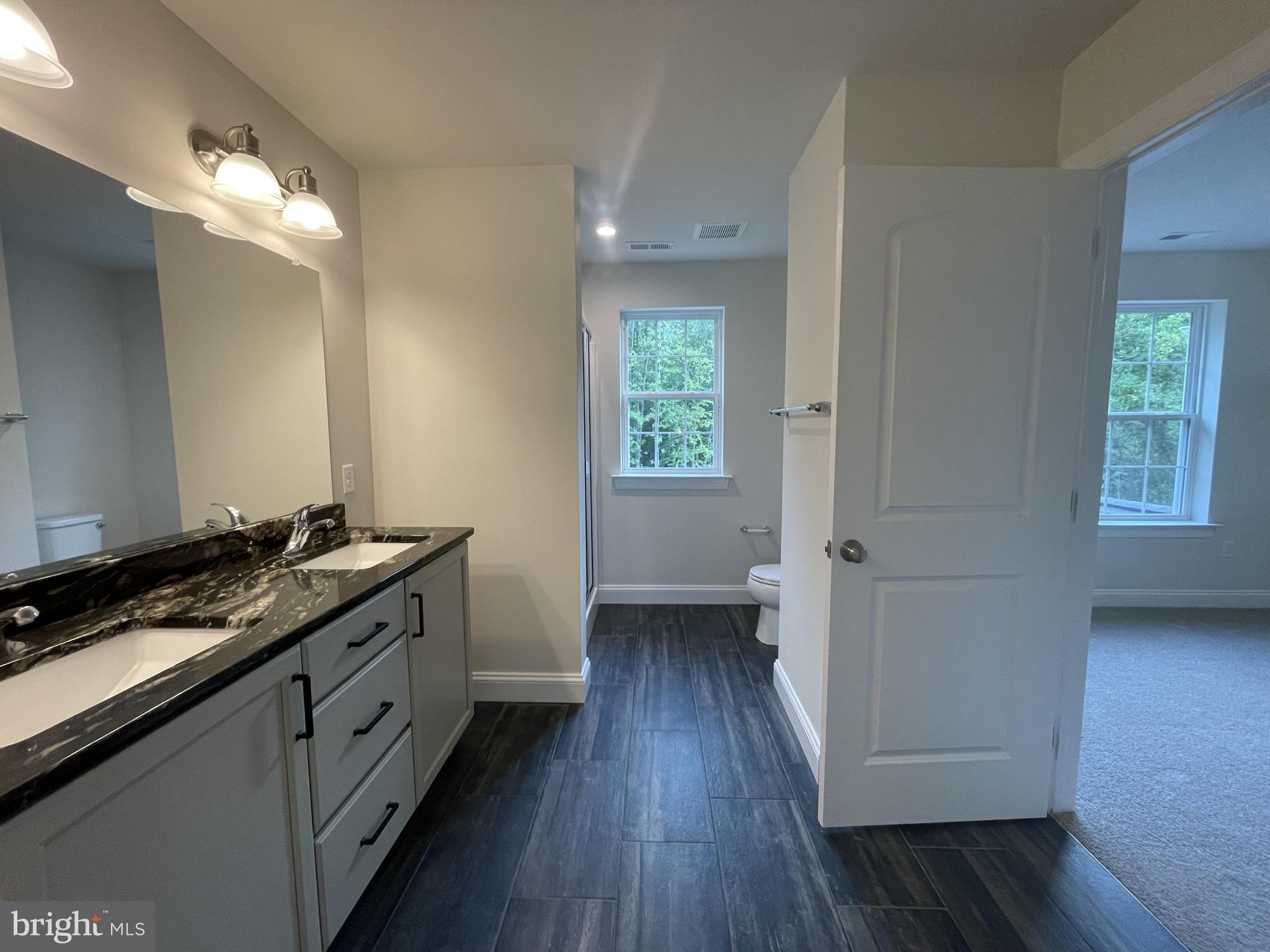 689 Cheyney Road Glen Mills, PA 19319 - Photo 9 of 11 a kitchen with sink and cabinets