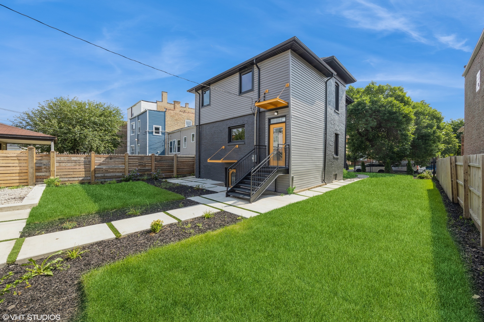 2230 South Ridgeway Avenue Chicago, IL 60623 - Photo 12 of 13 a front view of house with yard and green space