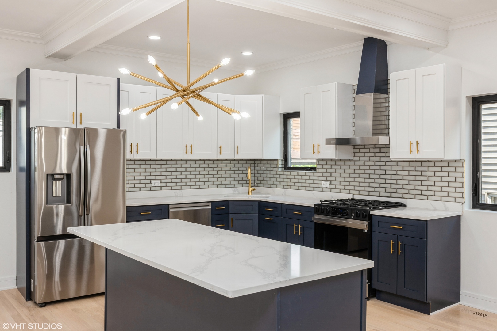 2230 South Ridgeway Avenue Chicago, IL 60623 - Photo 4 of 13 a kitchen with stainless steel appliances a sink stove and refrigerator