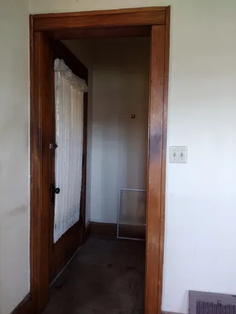 a view of elevator with hallway