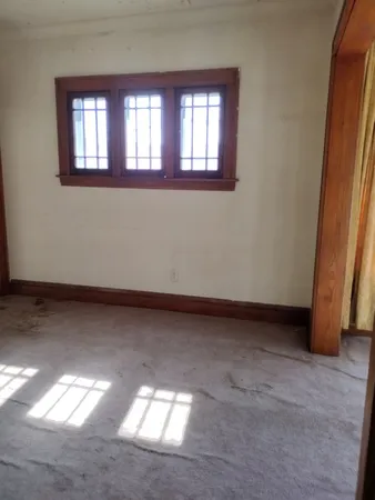 an empty room with windows