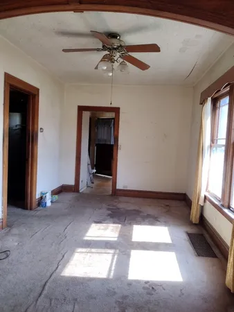 a bathroom with a sink toilet and mirror