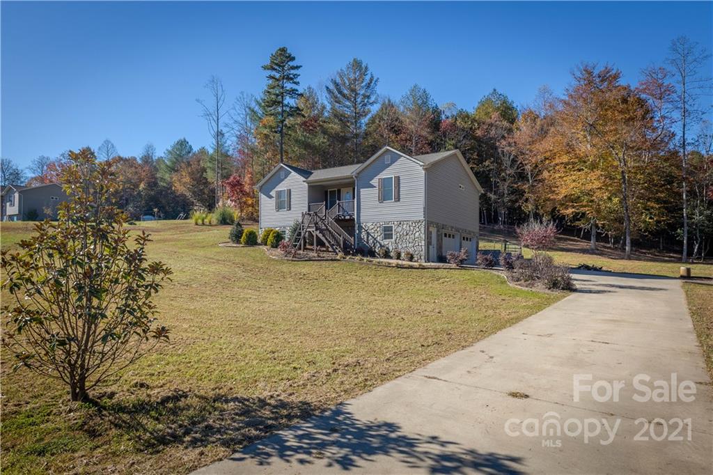 3604 Deerbrook Road Lenoir, NC 28645 - Photo 1 of 21 a view of a house with a yard