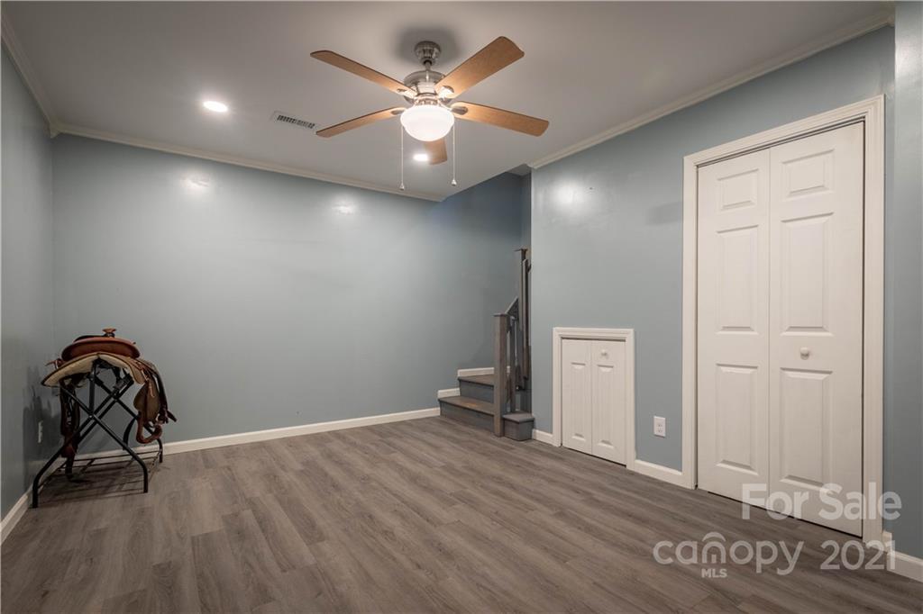 3604 Deerbrook Road Lenoir, NC 28645 - Photo 18 of 21 wooden floor in an empty room with a window