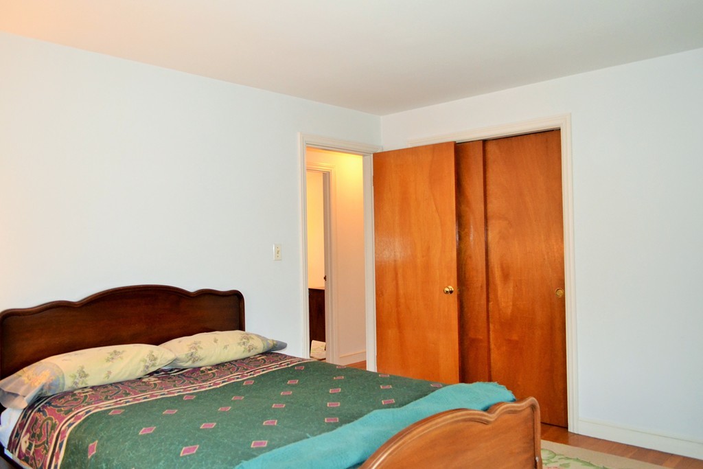 10 Crestline Circle Beverly, MA 01915 - Photo 13 of 22 a bedroom with a bed and a window