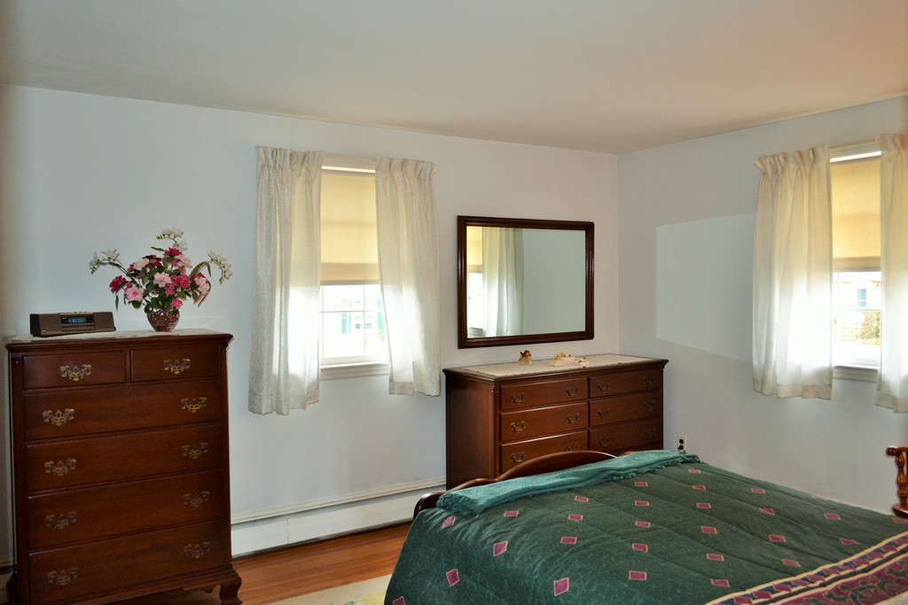 10 Crestline Circle Beverly, MA 01915 - Photo 14 of 22 a bedroom with a bed and a window
