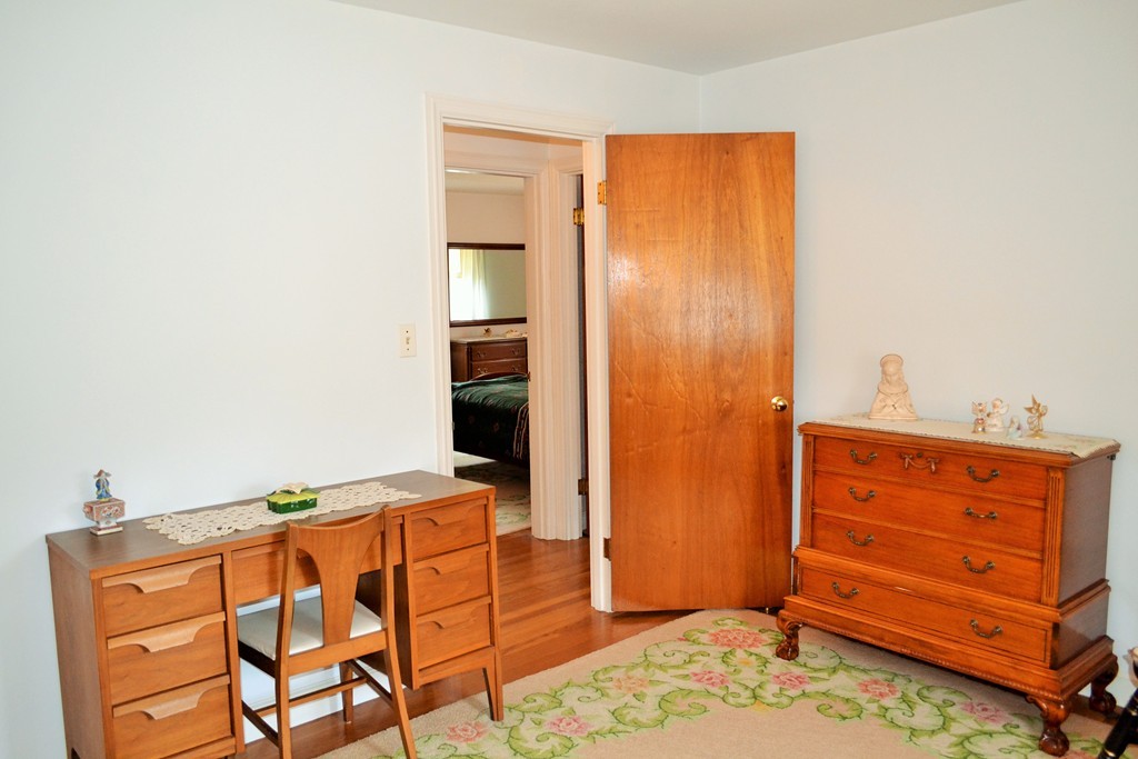10 Crestline Circle Beverly, MA 01915 - Photo 15 of 22 a view of a bedroom with furniture and closet