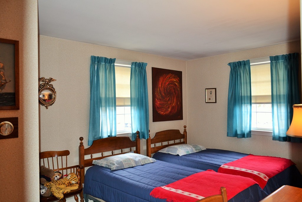 10 Crestline Circle Beverly, MA 01915 - Photo 17 of 22 a bedroom with a bed and a window