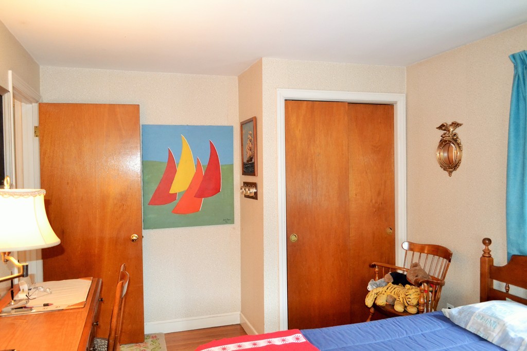 10 Crestline Circle Beverly, MA 01915 - Photo 18 of 22 a view of a bedroom with furniture and wooden floor