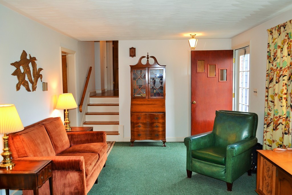 10 Crestline Circle Beverly, MA 01915 - Photo 7 of 22 a living room with furniture and a window