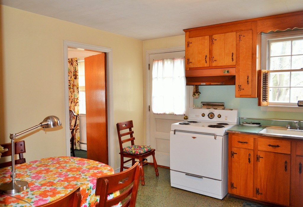 10 Crestline Circle Beverly, MA 01915 - Photo 8 of 22 a bedroom with a bed and a window