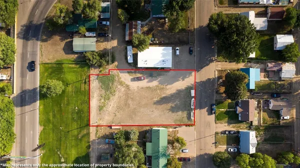 an aerial view of houses with outdoor space