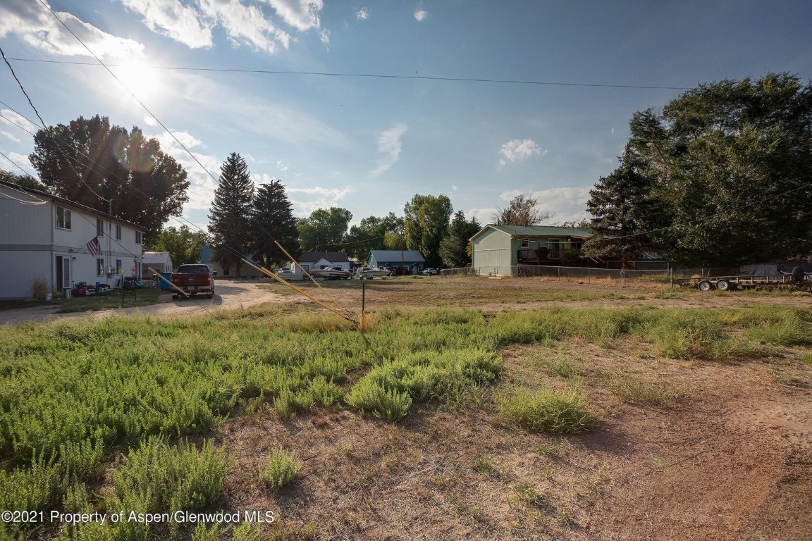 0 Washington Street Craig, CO 81625 - Photo 2 of 12 a view of outdoor space with deck and yard
