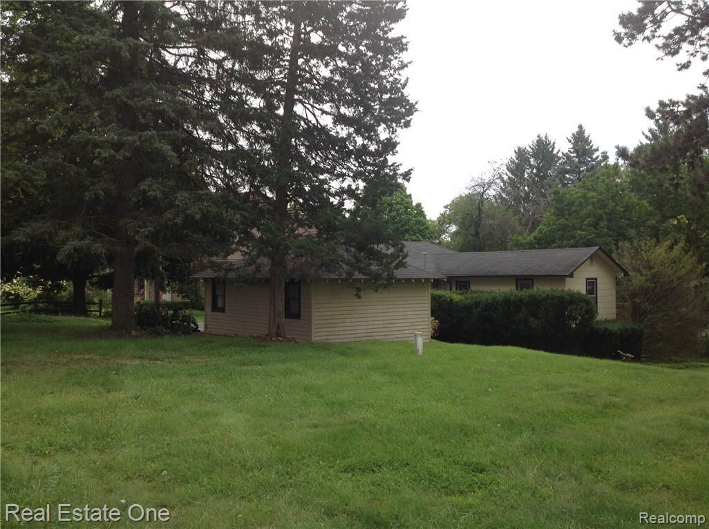 6337 Maybee Road Clarkston, MI 48346 - Photo 12 of 59 Angled View Of Garage & Home