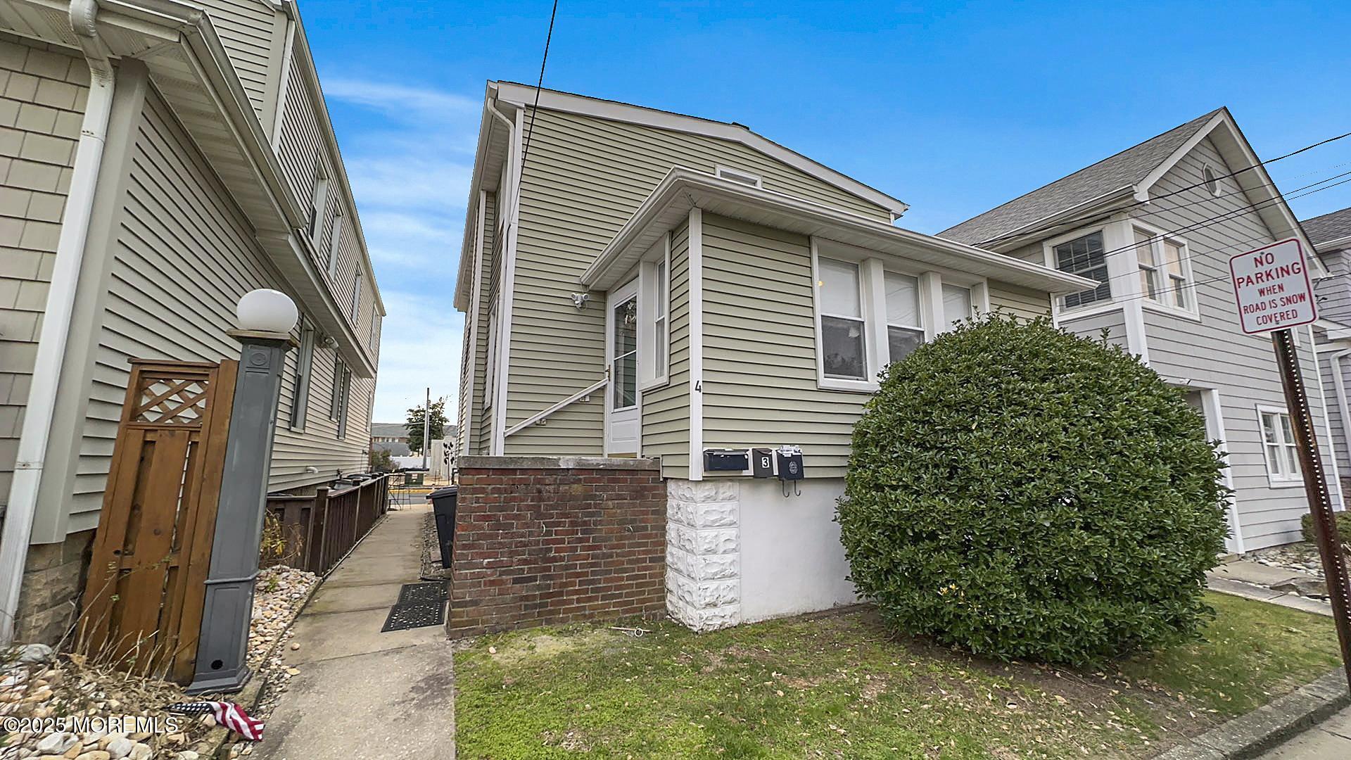 4 Via Ripa, Unit 3 Sea Bright, NJ 07760 - Photo 10 of 14 a view of a house with a yard