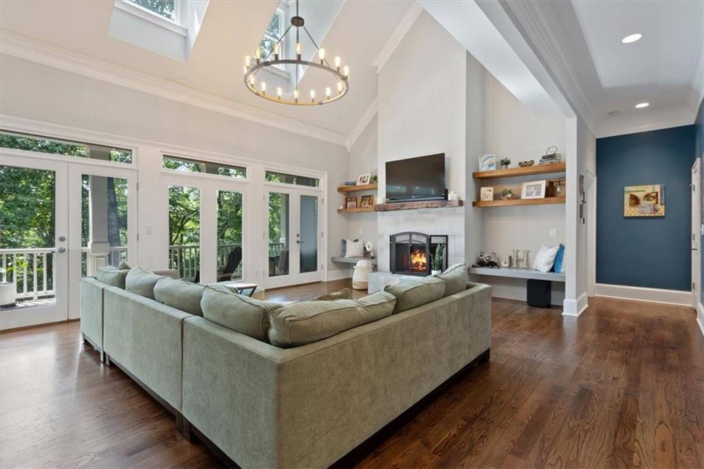 134 Prospector Ridge Dahlonega, GA 30533 - Photo 21 of 96 a living room with fireplace furniture and a flat screen tv