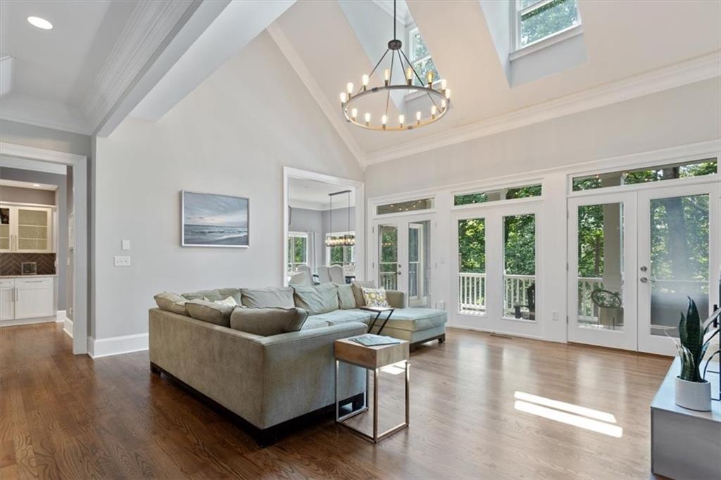 134 Prospector Ridge Dahlonega, GA 30533 - Photo 24 of 96 a living room with furniture and a large window
