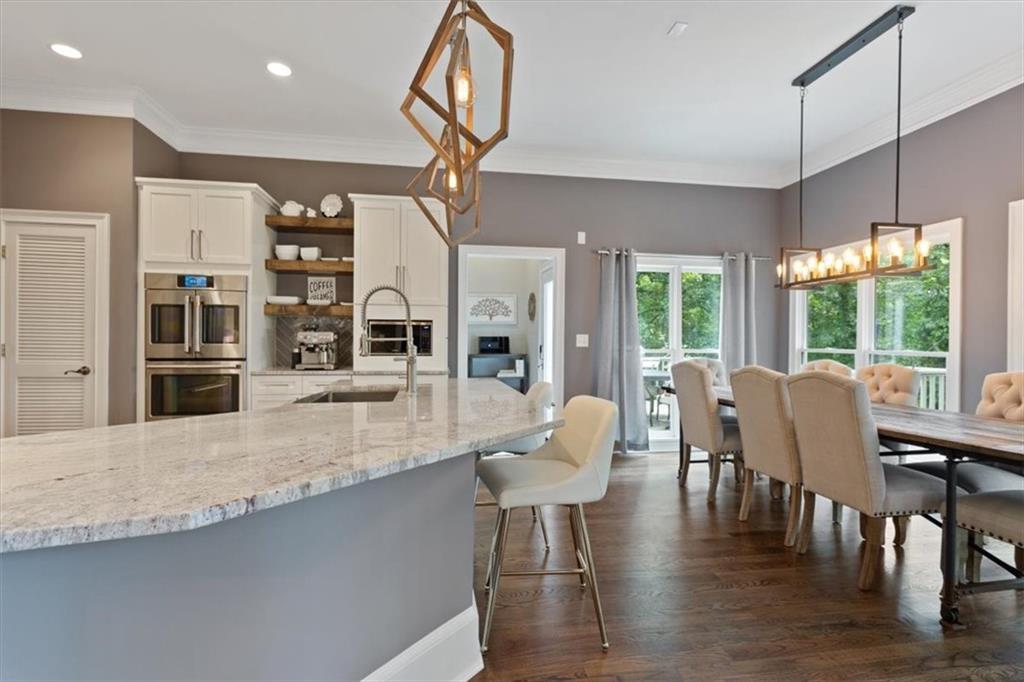 134 Prospector Ridge Dahlonega, GA 30533 - Photo 25 of 96 a view of a dining room with furniture window and wooden floor