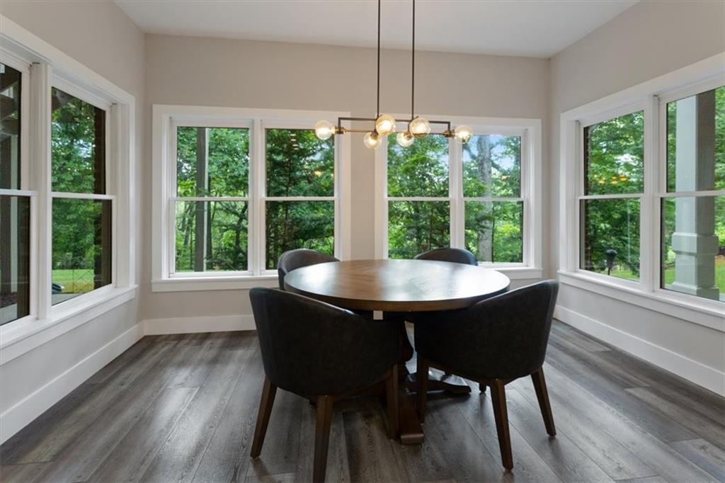 134 Prospector Ridge Dahlonega, GA 30533 - Photo 68 of 96 a view of a dining room with furniture window and wooden floor
