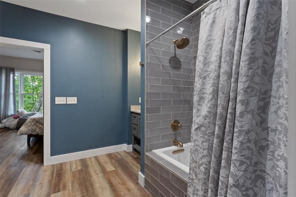 134 Prospector Ridge Dahlonega, GA 30533 - Photo 69 of 96 a bathroom with a sink and shower