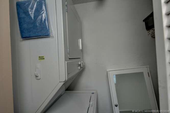 1950 Southwest Palm City Road, Unit 3209 Stuart, FL 34994 - Photo 27 of 64 In unit stackable washer and dryer.