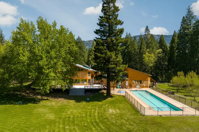 a view of a house with swimming pool
