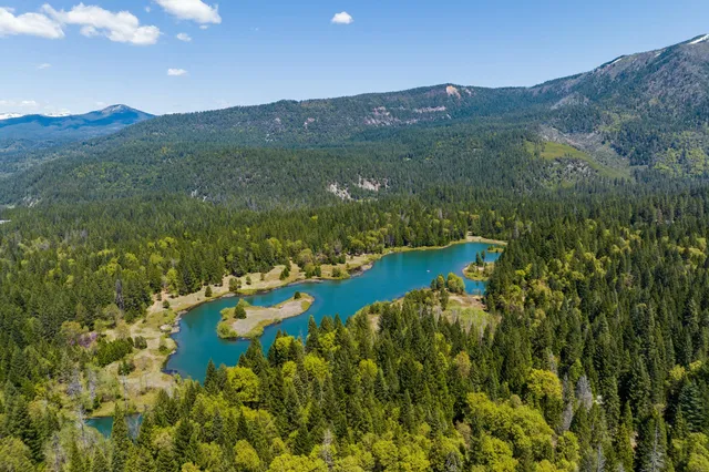 a view of a lake with a mountain in the background