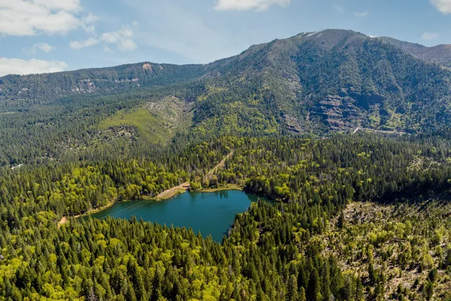 a view of a lake with mountains in the background
