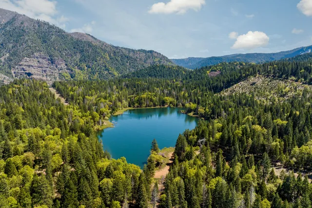 a view of a lake with a mountain in the background