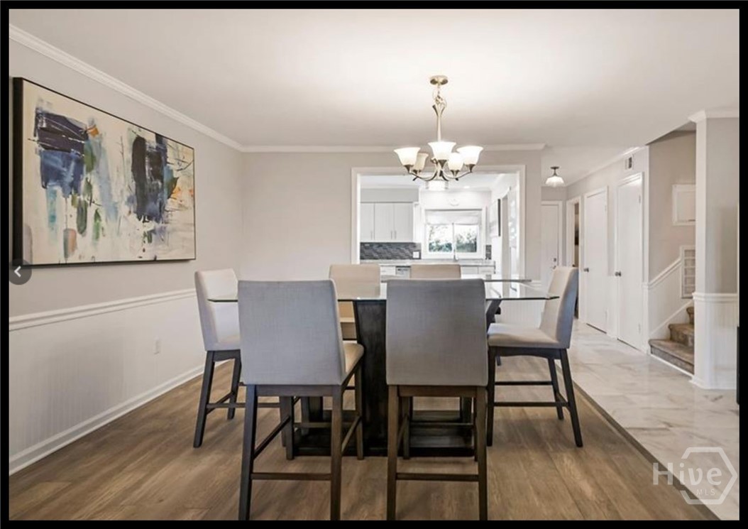 12502 Apache Avenue, Unit 4 Savannah, GA 31419 - Photo 10 of 17 Spacious social area of Unit 4 is flowing to the marsh view.